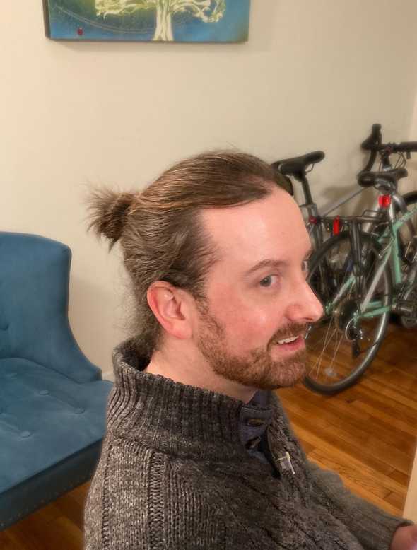 Me, with the same man bun, but from a different angle